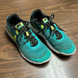 Nike Teal, yellow & black Running Shoes women’s Size 9